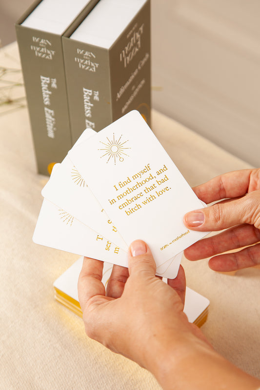 Gold-foiled badass motherhood cards with bold language